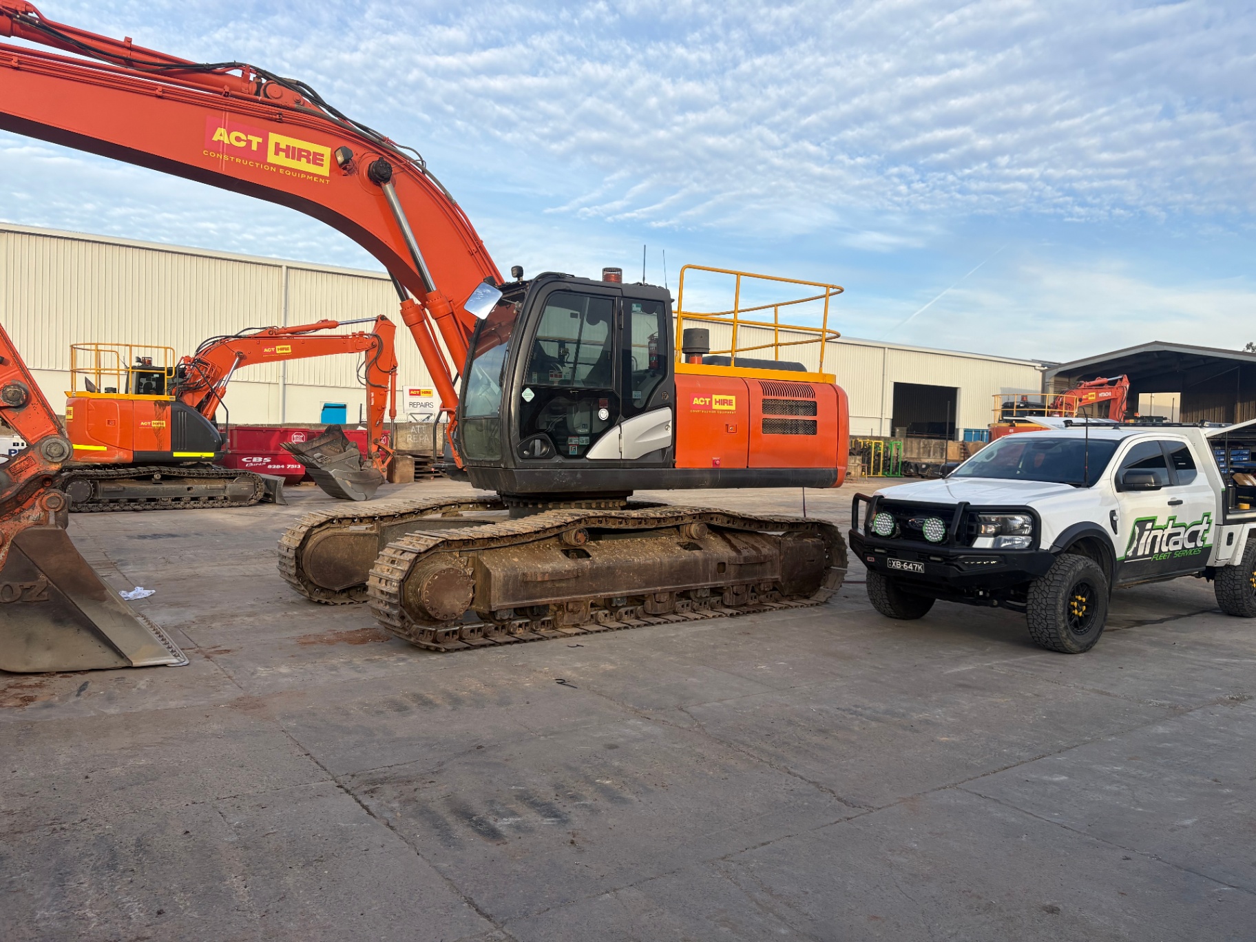 Intact Fleet Services ute on a Hitachi excavator service job